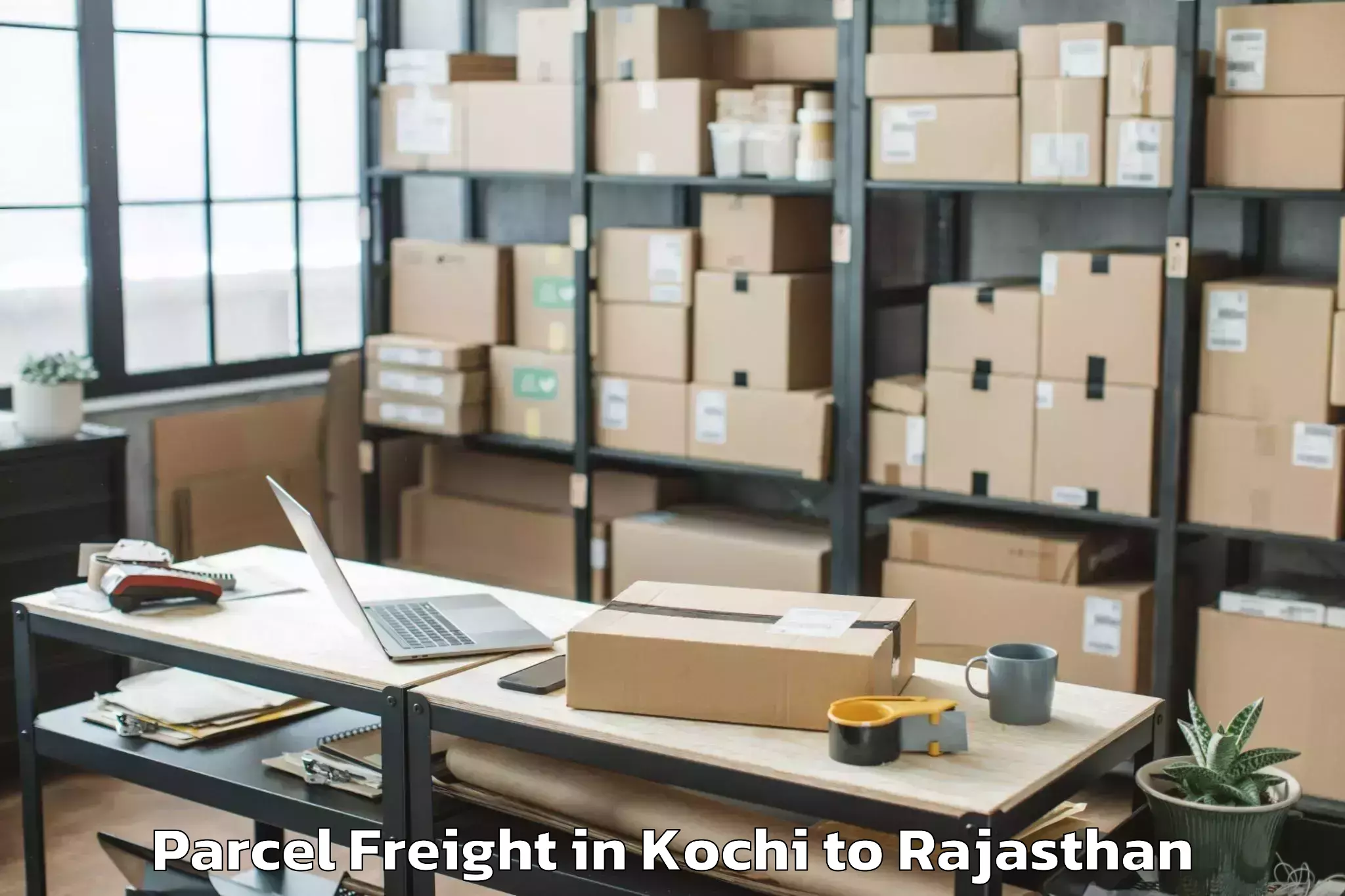 Top Kochi to Hindoli Parcel Freight Available